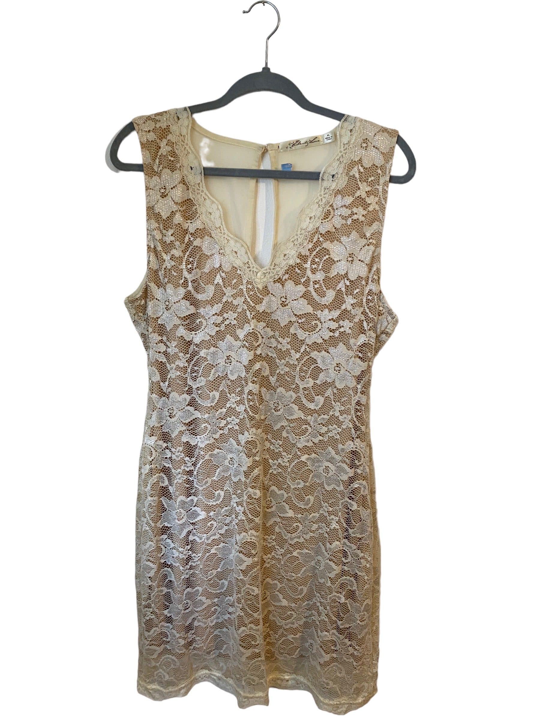 Vestido de encaje crema